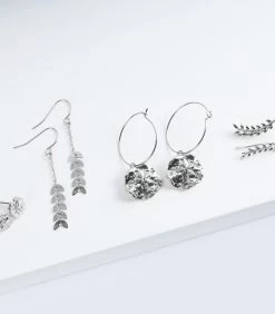 Geurkaars Ceder Met Zilveren Oorbellen 11 Geurkaars Ceder Met Zilveren Oorbellen -Professionele winkel voor decoratieve artikelen 3d356d6f181240c885861e7a7fd896ba 1